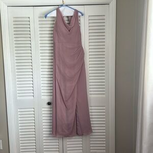 Sleeveless dress, slit down the side